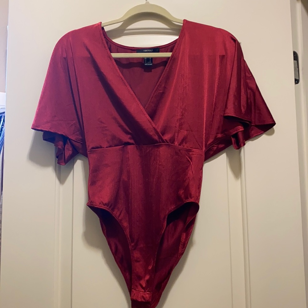 Red v neck low cut bodysuit
